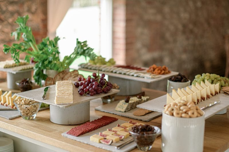 Food station with cheeses, West Sussex. Bespoke Food